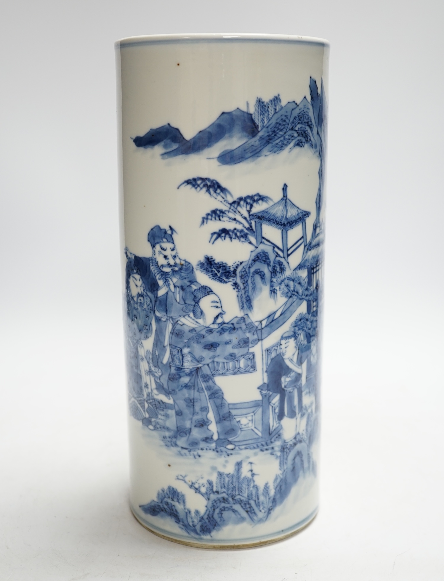A Chinese blue and white ‘sages’ cylindrical brushpot, 19th century